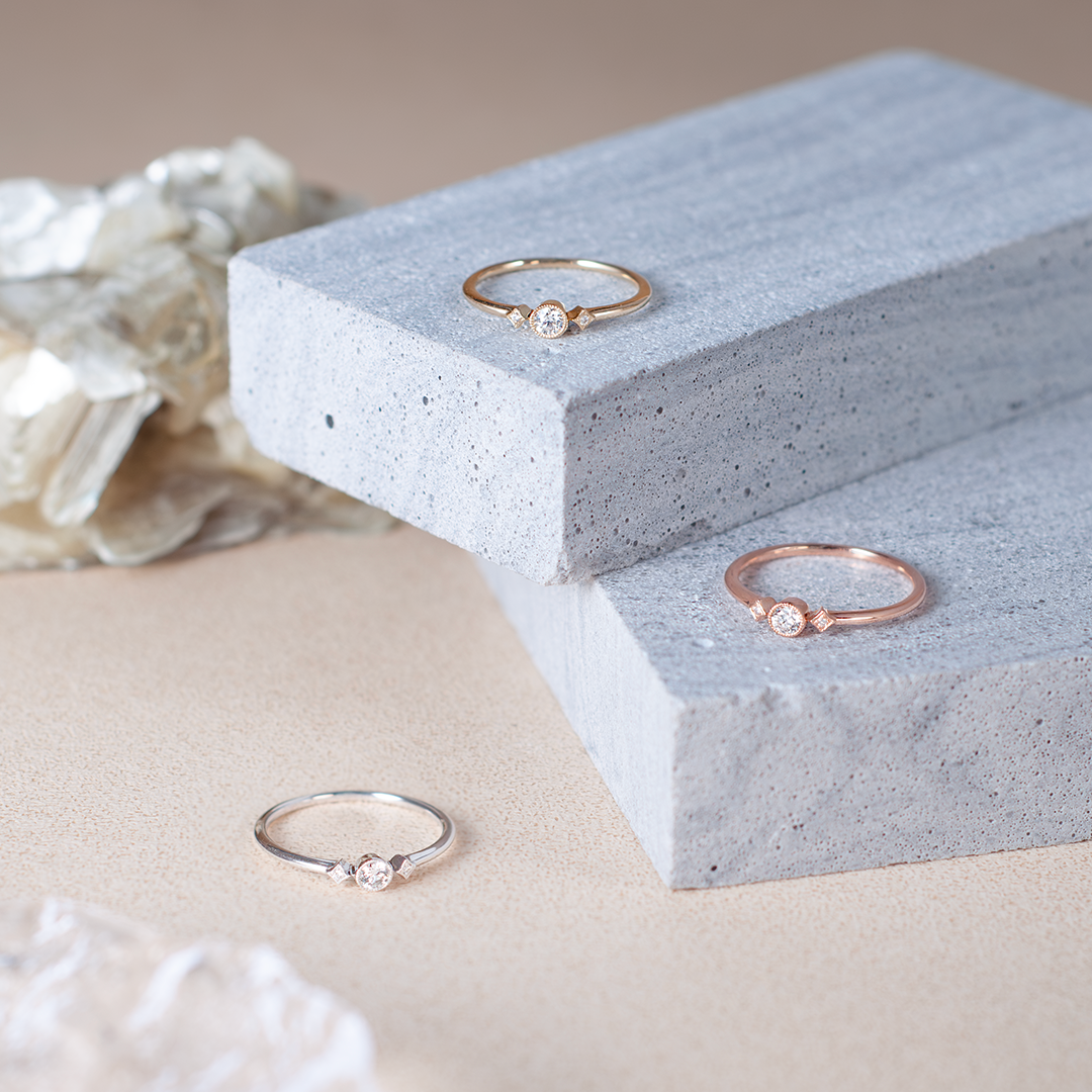 Mini beads tri-stone diamond ring